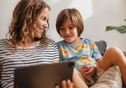 Mother and child using tablet