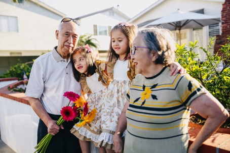 grandparents with grandchildren outside