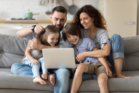 Family looking at computer